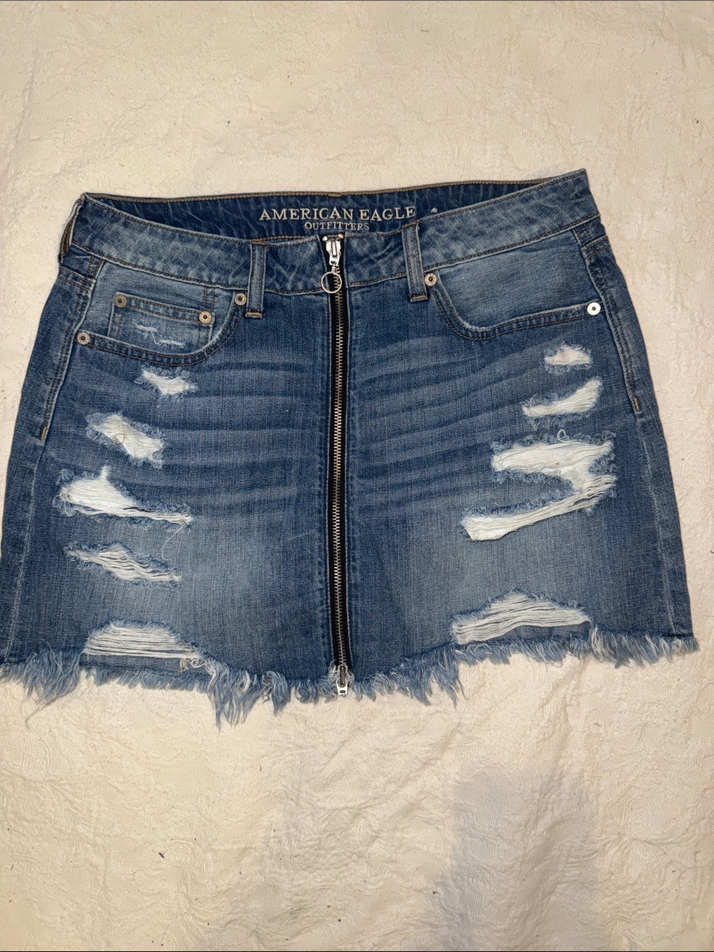 American Eagle Outfitters Distressed Zip-Front Denim Mini Skirt in Blue
